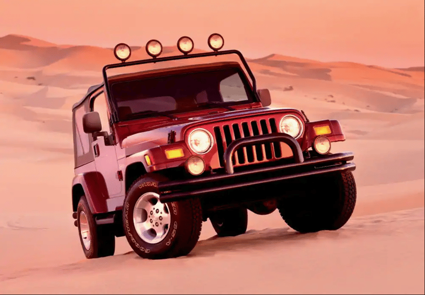 A Jeep Wrangler TJ in a desert.