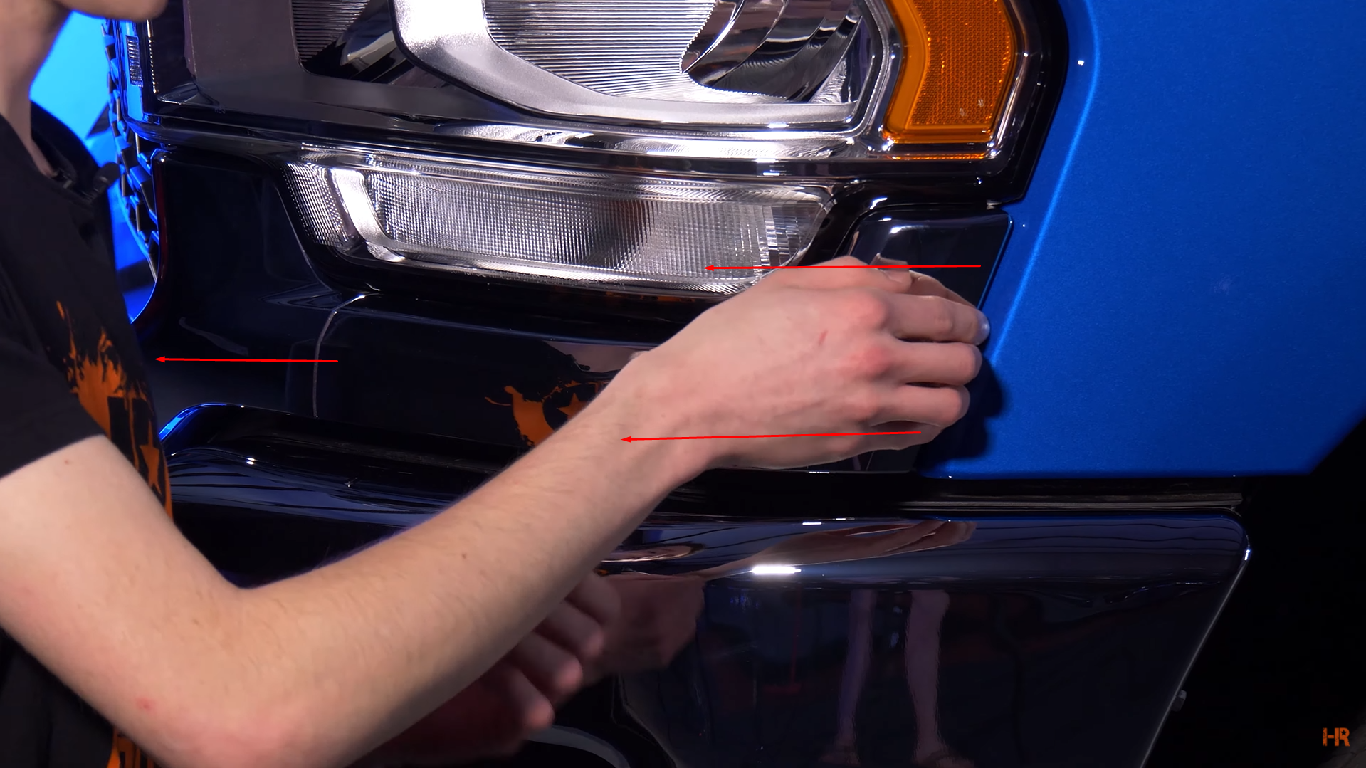Instructions on how to remove the chrome panel beneath the Ram HD headlights.