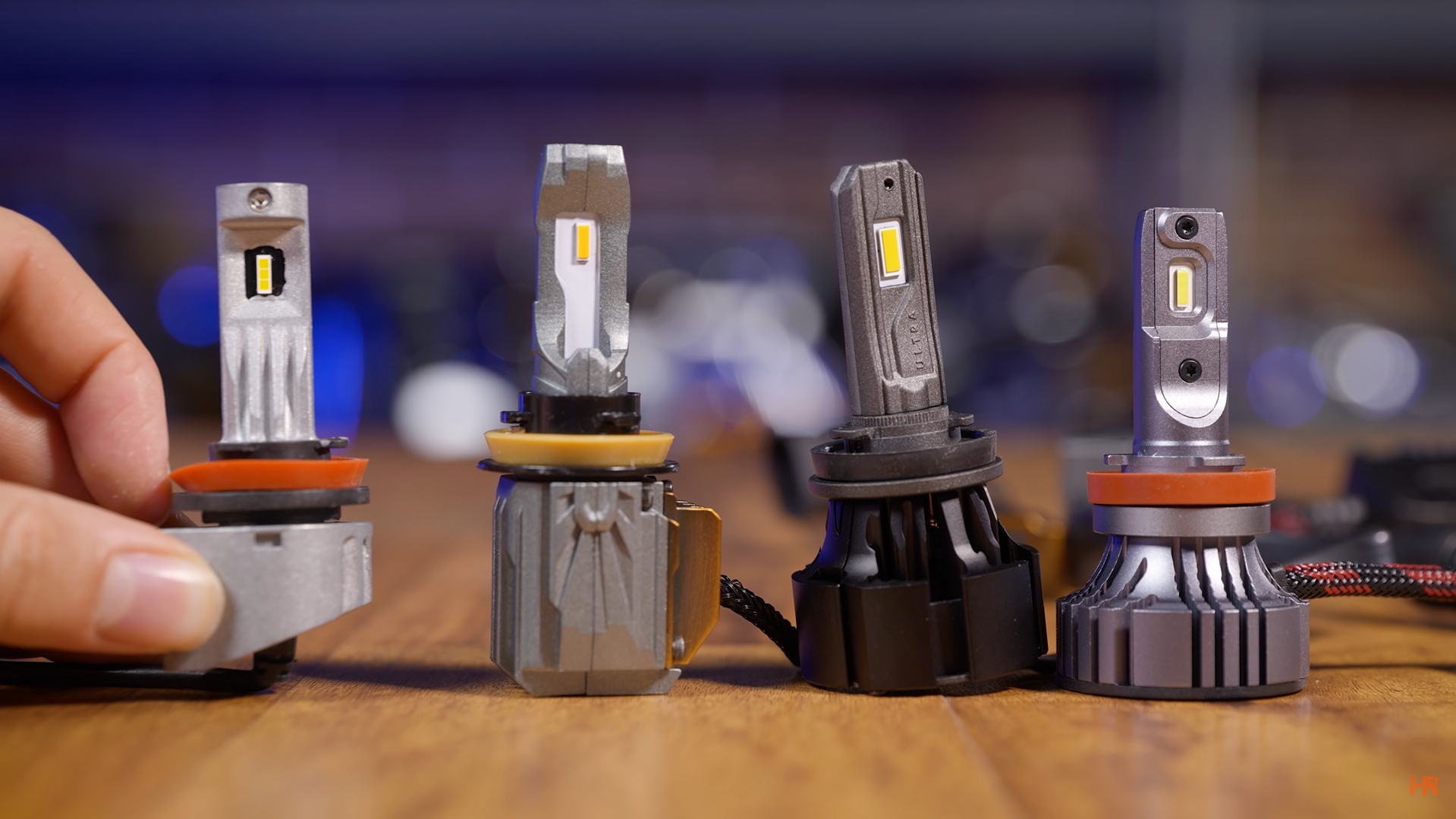 Four yellow-chipped LED bulbs sit next to one another.