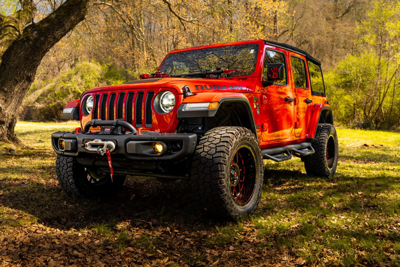 red-jeep-with-fog-lights